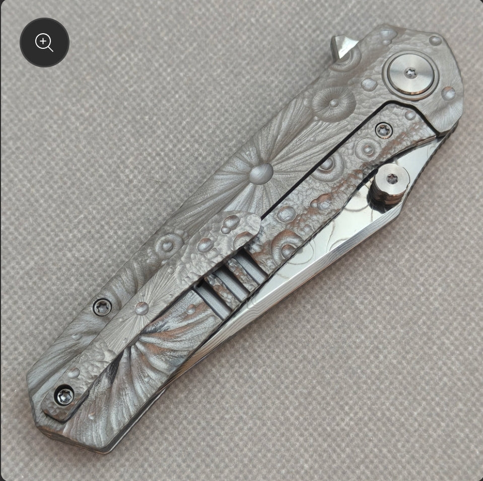Vorixn “Impact Origin” Flipper & Thumb Stud Knife Titanium-Engraved Anodized Handle (3.6" Damascus steel Blade) KB098